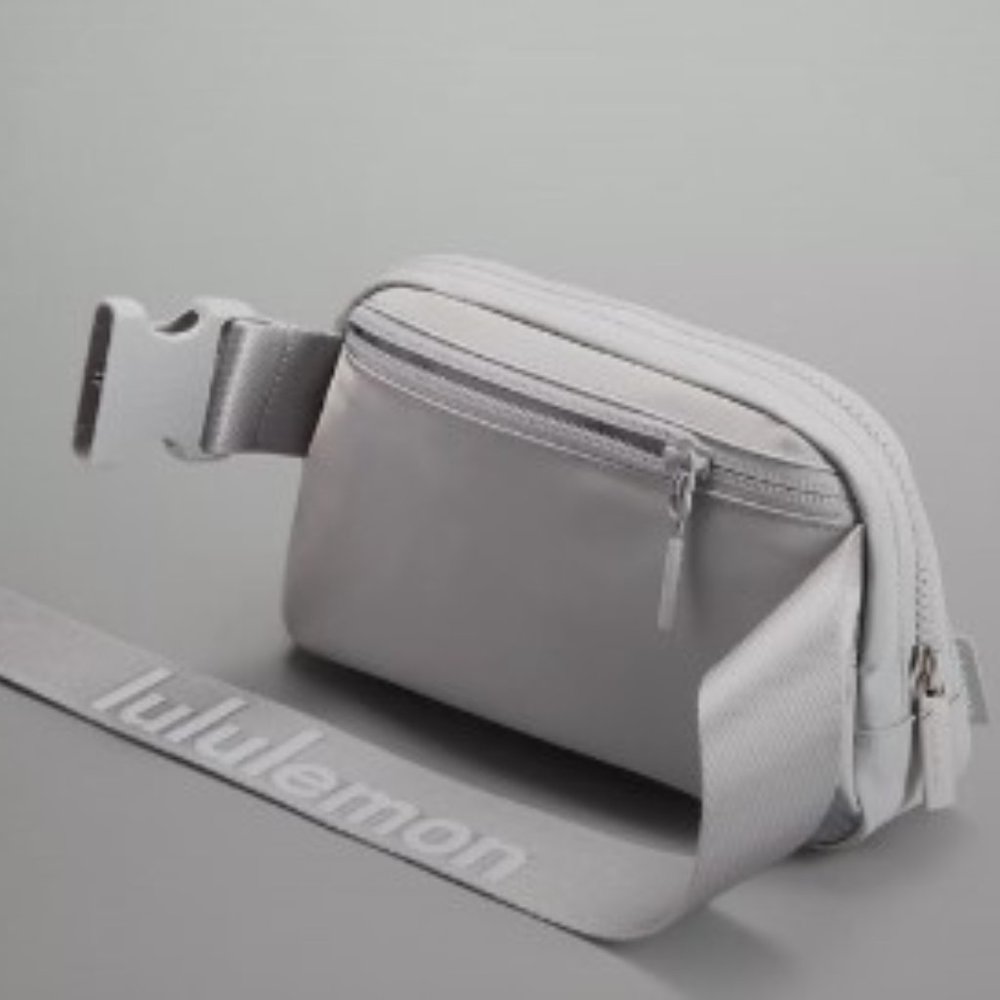 Lululemon Everywhere Belt Bag with logo in silver.